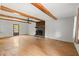 Spacious living room with beautiful hardwood flooring and a cozy fireplace, great for gatherings and relaxation at 230 Oakridge Se Dr, Cartersville, GA 30121