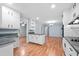Bright kitchen with granite countertops, stainless appliances, and hardwood floors at 3047 Hudson Ct, Decatur, GA 30033