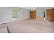 Open-concept living area featuring a fireplace, and sliding doors to the backyard at 3047 Hudson Ct, Decatur, GA 30033