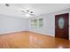 Bright living room featuring hardwood floors and a ceiling fan at 3047 Hudson Ct, Decatur, GA 30033