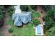 Stunning aerial view of a home showcasing its spacious yard, pool, and well-manicured landscaping at 3140 Thoreau Ct, Loganville, GA 30052