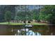 Private lake access with a charming dock and room for boats at 3140 Thoreau Ct, Loganville, GA 30052