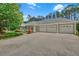Three-car garage plus plenty of paved parking at 3140 Thoreau Ct, Loganville, GA 30052