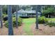 Beautiful home exterior with a well-maintained lawn and landscaping, offering great curb appeal at 3140 Thoreau Ct, Loganville, GA 30052