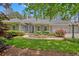 Charming single-story home featuring manicured landscaping, a three-car garage, and a welcoming entrance at 3140 Thoreau Ct, Loganville, GA 30052