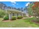 Charming single-story home featuring manicured landscaping, and a welcoming entrance at 3140 Thoreau Ct, Loganville, GA 30052