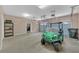 Spacious garage featuring a golf cart, storage, and access to the home at 3140 Thoreau Ct, Loganville, GA 30052
