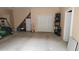 Spacious garage perfect for storage and parking with a golf cart at 3140 Thoreau Ct, Loganville, GA 30052