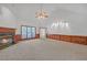 Bright living room with fireplace, vaulted ceiling, and large windows at 3140 Thoreau Ct, Loganville, GA 30052