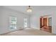 This living room gets plenty of natural light from its two windows with views of the lawn at 3140 Thoreau Ct, Loganville, GA 30052