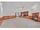 Spacious living room features a fireplace, and a built-in entertainment center, perfect for relaxing and entertaining at 3140 Thoreau Ct, Loganville, GA 30052