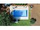 Aerial view of the covered pool area with chairs at 3140 Thoreau Ct, Loganville, GA 30052
