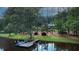 Picturesque waterfront property with a private dock and boat, ideal for enjoying lakeside living and recreation at 3140 Thoreau Ct, Loganville, GA 30052