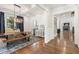Sophisticated dining room featuring a decorative chandelier and refinished hardwood flooring at 3834 Chamblee Dunwoody Rd, Atlanta, GA 30341