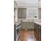 Kitchen with stainless steel range and stone countertops at 3834 Chamblee Dunwoody Rd, Atlanta, GA 30341