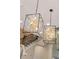 Statement lighting fixtures above center island at 3834 Chamblee Dunwoody Rd, Atlanta, GA 30341