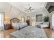 Spacious main bedroom suite features vaulted ceilings, a large rug and a sitting area at 3834 Chamblee Dunwoody Rd, Atlanta, GA 30341
