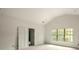 A bedroom features light walls, hardwood floors, and natural light from the window, creating a comfortable atmosphere at 1115 Ralph Ne Rd, Atlanta, GA 30324