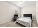 Cozy bedroom with carpet, window and a contemporary designed bed and bedding at 228 Whitneys Way, Dallas, GA 30157