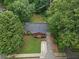 Aerial view showcasing a home with a well-maintained yard and a lovely covered porch at 3510 Dunn Se St, Smyrna, GA 30080