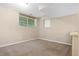 Carpeted basement room with a small window and neutral walls at 3510 Dunn Se St, Smyrna, GA 30080
