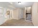 Finished basement area features carpeted floors, stairs, and white cabinets at 3510 Dunn Se St, Smyrna, GA 30080