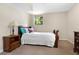 Charming bedroom with carpet flooring, a decorative lamp, and a warm, inviting ambiance at 3510 Dunn Se St, Smyrna, GA 30080
