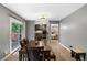 Spacious dining room with views into the kitchen, ideal for entertaining guests at 3510 Dunn Se St, Smyrna, GA 30080
