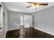 Bright main bedroom with hardwood floors and easy access to the en-suite bathroom at 3510 Dunn Se St, Smyrna, GA 30080