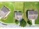 Aerial view of a home with fenced backyard, mature trees, and neighboring properties at 3524 Preserve Run Trl, Loganville, GA 30052