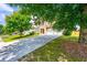 Attractive two-story home featuring a spacious driveway and a well-maintained front lawn at 3524 Preserve Run Trl, Loganville, GA 30052