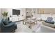 Bright and airy living room boasts stylish furnishings, modern decor, and a comfortable seating arrangement at 3524 Preserve Run Trl, Loganville, GA 30052