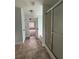 Bathroom featuring tiled floors, walk-in shower, and a tub at 4069 Savannah Ridge Ct, Loganville, GA 30052