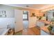 Bright bathroom features a granite countertop vanity, decorative fixtures and an open door to the bedroom at 626 Dahoma Trail Trl, Woodstock, GA 30188