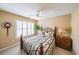 Bedroom with natural light, shutters, and decorative accents at 626 Dahoma Trail Trl, Woodstock, GA 30188