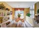 Charming dining area with natural light and wood flooring at 626 Dahoma Trail Trl, Woodstock, GA 30188