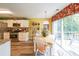 Eat-in kitchen featuring stainless steel appliances and lots of light at 626 Dahoma Trail Trl, Woodstock, GA 30188
