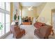 Spacious living room with fireplace, high ceilings, and ample natural light at 626 Dahoma Trail Trl, Woodstock, GA 30188
