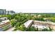 Expansive city views of buildings and lush greenery from an elevated vantage point with other homes nearby at 2881 Peachtree Ne Rd # 1202, Atlanta, GA 30305