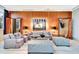 Relaxing living room with wood paneled walls, stylish seating, soft lighting, and unique decor at 2881 Peachtree Ne Rd # 1202, Atlanta, GA 30305