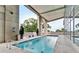 A spacious outdoor swimming pool with lounge chairs and city views at 2881 Peachtree Ne Rd # 1202, Atlanta, GA 30305