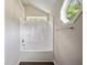 Bright bathroom with a shower and tub combo and a small window at 3915 Cypress Pointe Dr, Union City, GA 30291