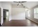 Bright bedroom featuring hardwood floors, a ceiling fan, and natural lighting at 3915 Cypress Pointe Dr, Union City, GA 30291