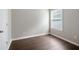 Bedroom features luxury vinyl flooring, neutral walls and natural light from the window at 3915 Cypress Pointe Dr, Union City, GA 30291