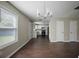Bright dining area with hardwood floors, a view of the kitchen, and natural light at 3915 Cypress Pointe Dr, Union City, GA 30291
