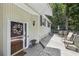 Relaxing back deck, ready for entertaining with seating, table, and umbrella at 405 Forest Valley Road, Sandy Springs, GA 30342
