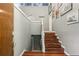 Inviting two-story entryway with hardwood floors and staircase leading to the upper level at 405 Forest Valley Road, Sandy Springs, GA 30342