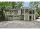 Contemporary home with a two-car garage and upper-level balcony at 405 Forest Valley Road, Sandy Springs, GA 30342