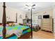 Colorful ' bedroom featuring bunk beds, bright bedding, and a decorative dresser at 621 Windgrove Se Rd, Marietta, GA 30067
