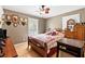 Cozy bedroom featuring a bed, multiple windows, and wood floors at 621 Windgrove Se Rd, Marietta, GA 30067
